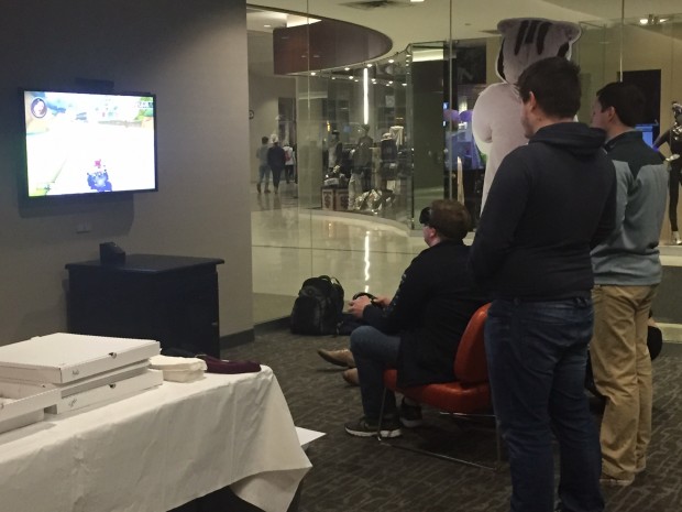 St. Thomas students participate in the Wellness Center's Mario Kart beer goggle tournament. Students with low scores on the mandatory alcohol quiz had to wear beer goggles while playing Mario Kart. (Noura Elmanssy/TommieMedia) 