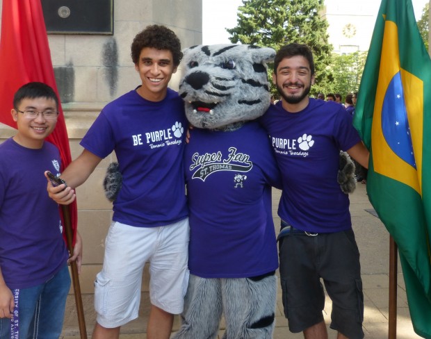 International students celebrate after marching through the arches. The number of international students studying in the U.S. is on the rise. (Courtesy of International student services/ University of St. Thomas).