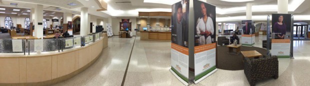 The Green Card Voices exhibit in the O'Shaughnes-Frey Library tells the story of immigrants who came to the United States. The exhibit was on display until March 11. (Emily Sweeney/TommieMedia)