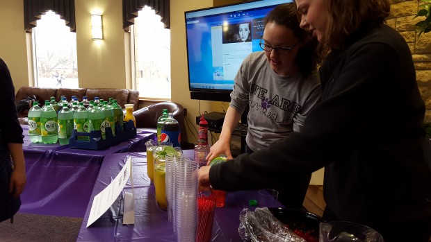 Sophomores Sarah Beck and Erin Kern demonstrate how to make mocktails during the Party Rockin' event. The goal of the event was to educate students about alcohol safety before spring break. (Meghan Meints/TommieMedia) 