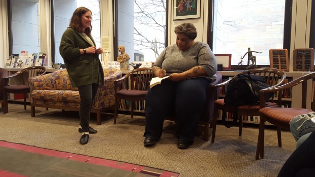 Alumna Bailey Fischer gets her book signed by Roxane Gay during the meet-and-greet held in the Women's Center Wednesday afternoon. Gay spoke as this year's Women's History Month lecturer. (Meghan Meints/TommieMedia)