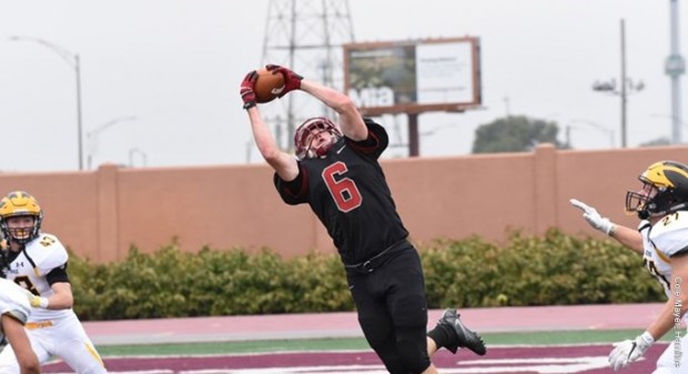 Josiah Harris reaches for a pass from Hamline quarterback Justice Spriggs during the Pipers' 42-40 victory Saturday over Gustavus Adolphus. Harris caught three scoring passes in the first half. (www.hamlineathletics.com) 