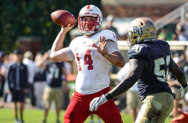 St. John's quarterback Ben Alvord lines up a pass Saturday against Bethel. Alvord, playing in place of the injured Jackson Erdmann, completed his first 14 passes.  (Sean Donohue/www.gojohnnies.com)