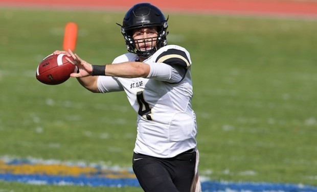 St. Olaf quarterback Jack Goldstein looks for a receiver Saturday against Carleton. Goldstein passed for 328 yards to help the Oles take their first MIAC victory of the season.