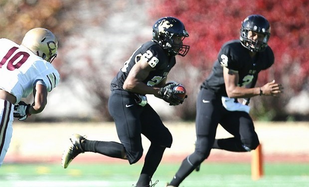St. Olaf's Khayleb Willis carries the ball Saturday against Concordia-Moorhead. Willis gained 83 yards for the Oles and scored twice, but Concordia dominated the second half to win. (St. Olaf athletics)