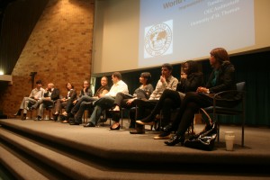 Ten journalists from the World Press Institute participated in a panel discussion in the O’Shaughnessy Educational Center auditorium. (Dan Cook/TommieMedia)