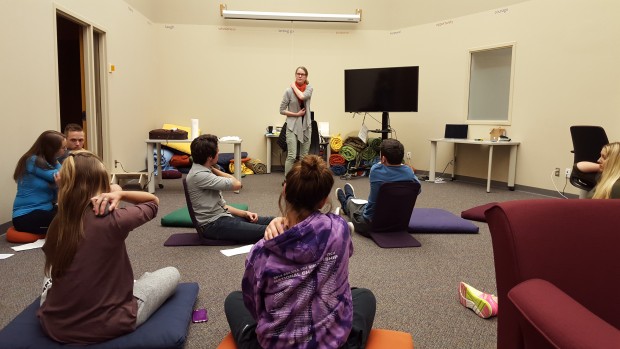 Students try out hot stone massage techniques. This activity was part an even put on by the Wellness Center to teach students how to deal with stress. (Meghan Meints/TommieMedia)