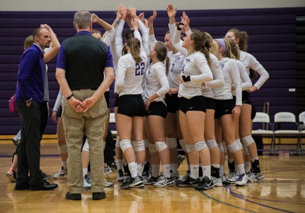 St. Thomas huddles after a winning point. The Tommies defeated Concordia-Moorhead 3-0 at the MIAC Quarterfinals Tuesday night in St. Paul. (Carlee Hackl/TommieMedia) 