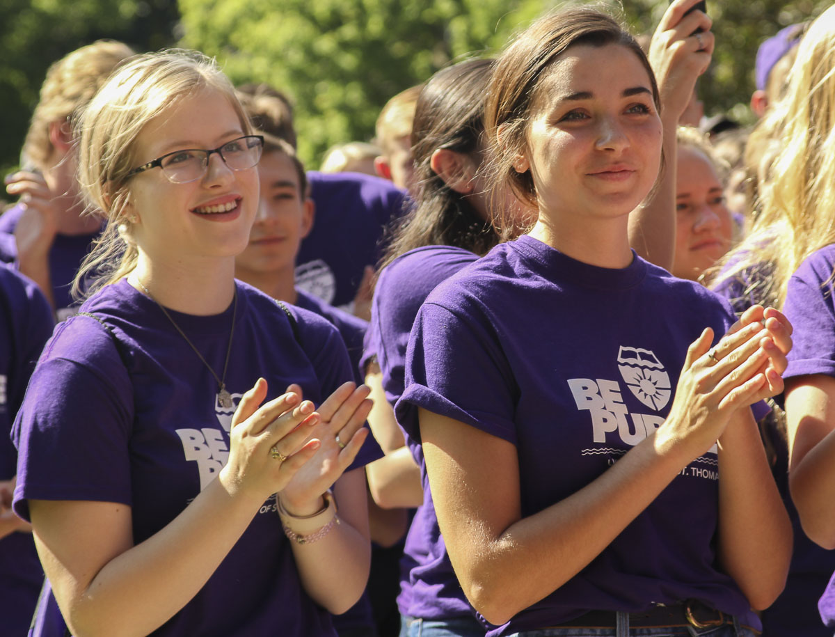 students clapping