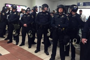 Law enforcement on the ground level tranport area at the Mall of America. A large protest that started at the Mall of America quickly migrated Wednesday to Minneapolis-St. Paul International Airport, where demonstrators blocked roads and caused significant traffic delays. (Leila Navidi/Star Tribune)