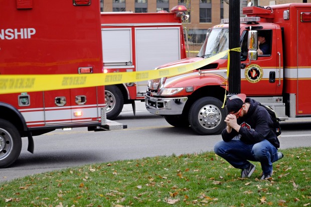 Student Nicholas Flores reacts as police respond to an attack on campus at Ohio State University on Monday in Columbus, Ohio. Multiple people were injured in the attack and a suspect was shot, school and hospital officials said. (AP photo)