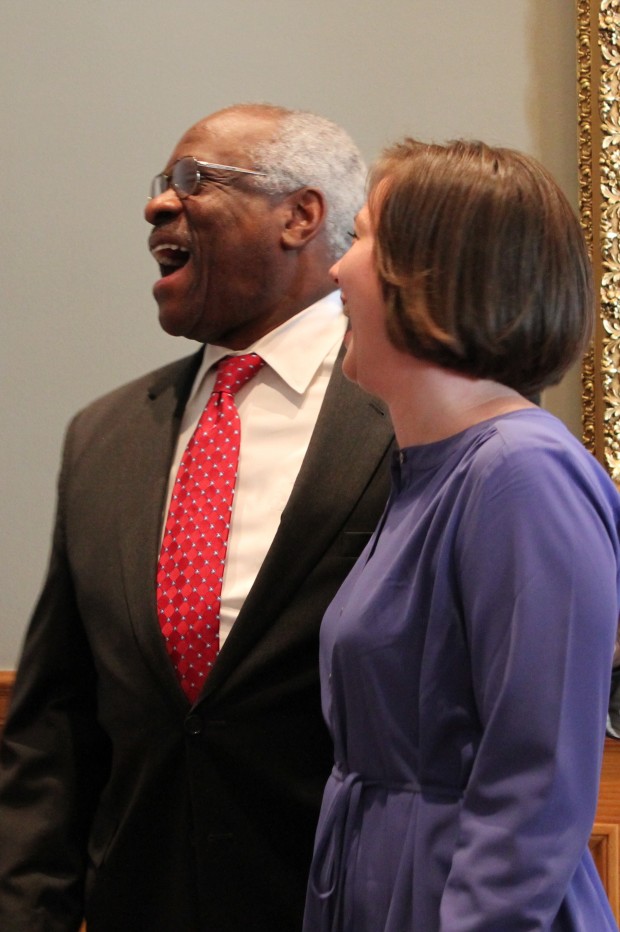 Quinlan Keller, then a junior, shares a laugh with Supreme Court Justice Clarence Thomas. Keller and 28 other students visited Washington, D.C., through the Catholic Studies Leadership Intern Program. 