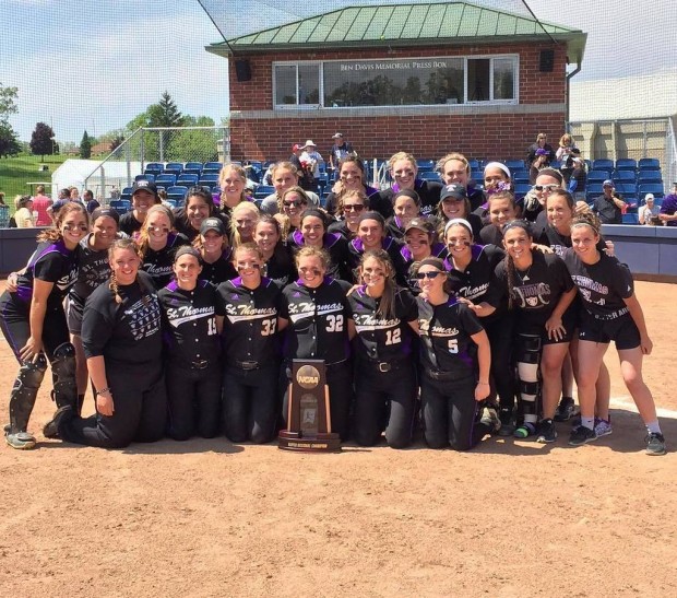 The Tommies pose in front of the Super Regional championship trophy. The team will head to Salem, Va., next week for the College World Series. (Photo courtesy of TommieSports)