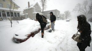 DSC02475 <p>Cars were buried in snow after the snowfall. (John Kruger/TommieMedia)</p>