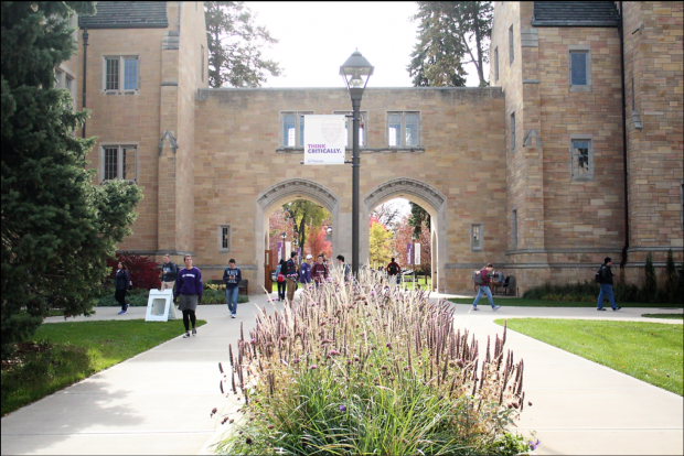 Students pass through the arches on a chilly fall day. Hopefully, by the end of this school year, many will be represented by a new dean of the College of Arts and Sciences. (Danielle Wong/TommieMedia) 