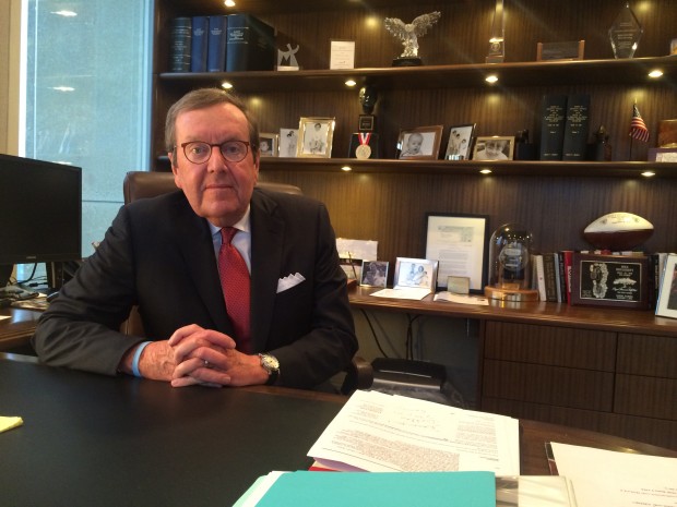 Mike Dougherty sits in his office overlooking Minneapolis. Dougherty is the namesake donor for the University of St. Thomas's new two-year school for students who demonstrate a high level of financial need. (Sophie Carson/ TommieMedia) 