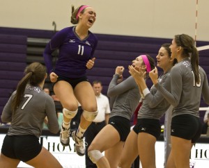 Outside hitter McKenna Reagan celebrates during the St. Thomas volleyball team's MIAC championship victory over St. Benedict Saturday. The NCAA announced Monday that St. Thomas will host its region in the playoff tournament starting Thursday. (Morgan Neu/TommieMedia) 