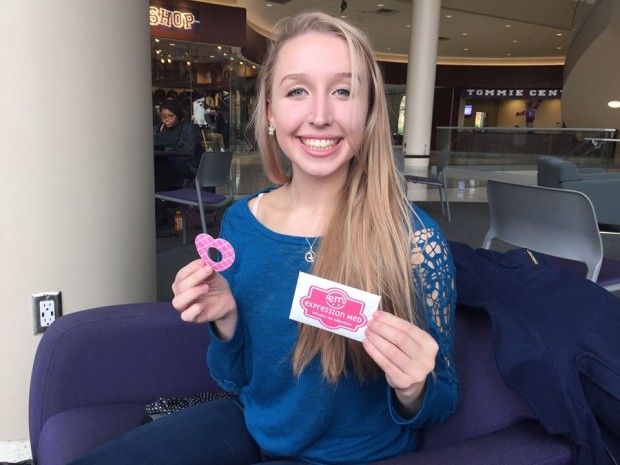 Meghan Sharkus shows off one of her adhesive products and package design. Sharkus started the company ExpressionMed for children with diabetes. (Mary Brickner/TommieMedia) 