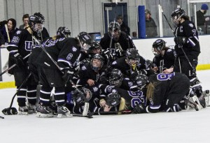 The team gathers on the ice in celebration of the victory in the NCAA quarterfinals. St. Thomas takes on Plattsburgh at 2:30 p.m. Friday. (Christina Theodoroff/TommieMedia) 