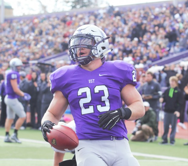 Running back Jordan Roberts celebrates after a touchdown. The Tommies lead Behel 21-14 at the half. (Andrew Brinkmann/TommieMedia)
