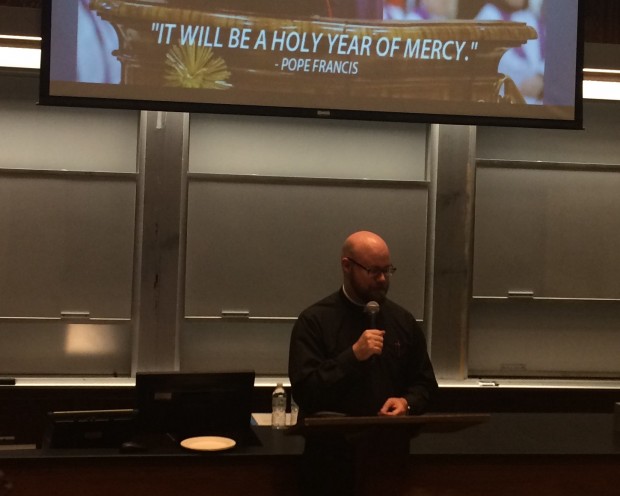 The Rev. John Floeder speaks as a part of the Prolife Center's speaker series on Tuesday, Oct. 21. He discussed the pope's declaration of the Year of Mercy and its relation to the topic of abortion. (Maggie Galush/TommieMedia)