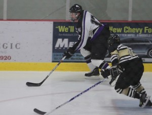 <p>Senioor defenseman Kyle Kranz states up the ice in a game against St. Olaf. The defense had a strong outing against Augsburg holding the Auggies scoreless.</p> 