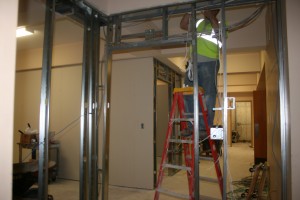 <p>Contruction crews transform Koch Fitness Center into a men's dormitory. (Rebekah Frank/TommieMedia)</p>