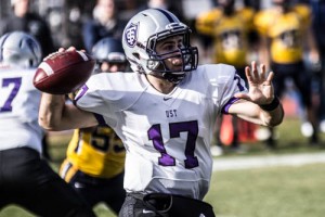 Quarterback John Gould sets to pass. The St. Thomas football team faces Carleton Saturday. (Jake Remes/TommieMedia)