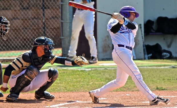 Outfielder Jake Smith finishes a swing in a game against Bethel last season. Smith had one of St. Thomas' four hits in Thursday's playoff loss against St. Mary's.(Carlee Hackl/TommieMedia) 