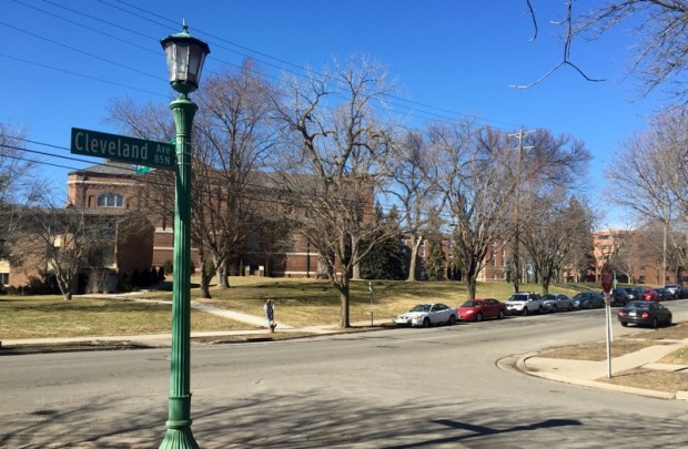 Cars are parked on the street across from the Florence Chapel. If bike lanes are put in on Cleveland Avenue, around 40 parking spaces on the east side of campus will be lost. (Claire Noack/TommieMedia) 