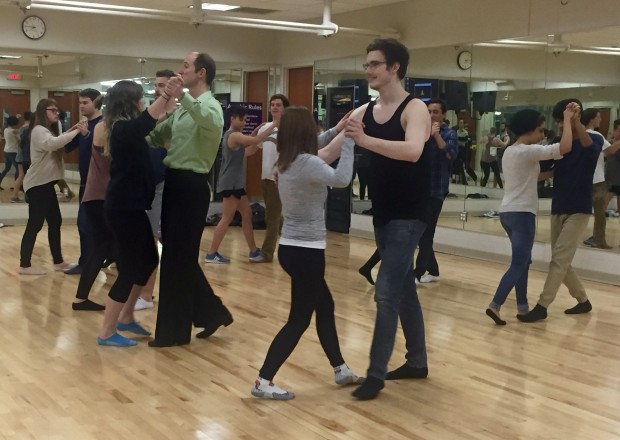 Students learn the Viennese Waltz from professional ballroom dancer Martin Pickering of Cinema Ballroom. Several students from the German Club organized ballroom dancing lessons on campus to prepare for the Viennese Ball last April at UW-Eau Claire. (File Photo/TommieMedia)  