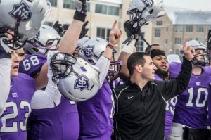 Coach Glenn Caruso and the St. Thomas football team celebrate after Saturday's victory over Gustavus. The Tommies earned an at-large bid to the NCAA playoffs and will face Wartburg College in Waverley, Iowa this Saturday. (Jake Remes/TommieMedia) 
