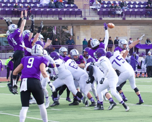 Senior defensive lineman Anthony King-Foreman blocks a Northwestern field goal attempt by Ben Lyons. The Tommies led 30-0 at half. (Meghan Vosbeek/TommieMedia) 