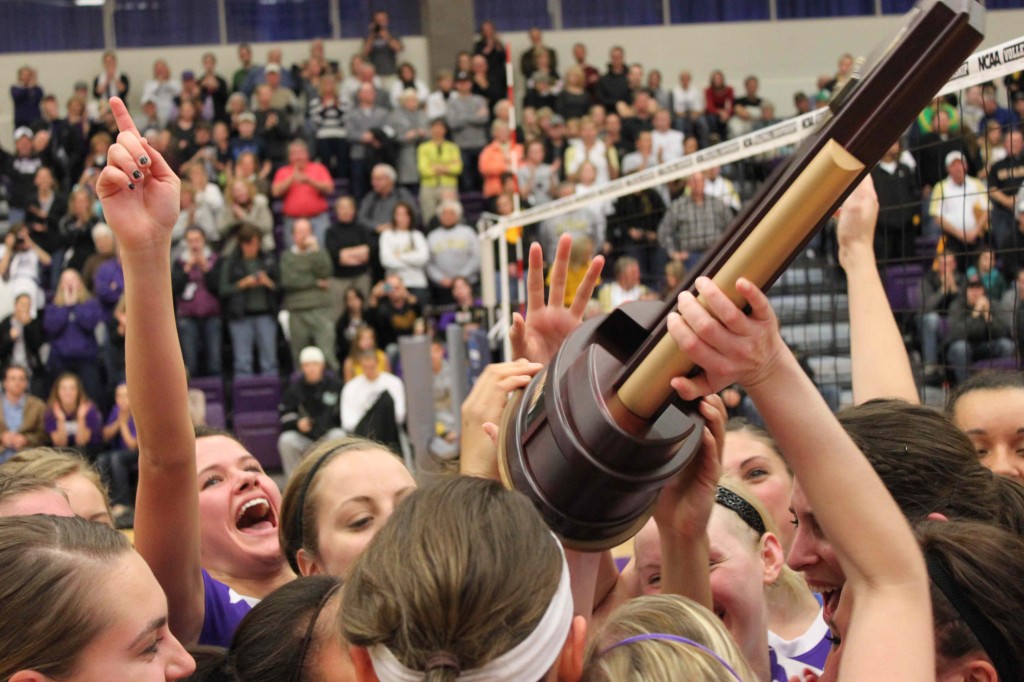 St. Thomas raises up the regional championship trophy and celebrates earning the first trip to the national tournament in school history. (Jordan Osterman/TommieMedia)