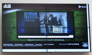 IMG_4483 <p>Caruso accepts the Liberty Mutual 2010 Coach of the Year trophy. Viewers could stream the event online. (Theresa Malloy/TommieMedia)</p>