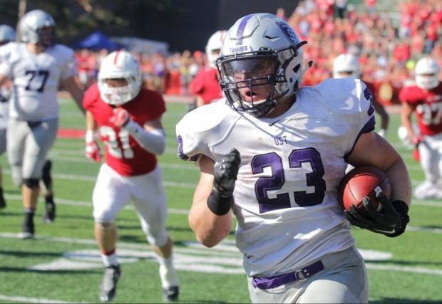 Running back Jordan Roberts sprints down the sideline for a portion of his 230 rushing yards in St. Thomas' 35-14 win over St. John's on Sept. 26. The Tommies and Johnnies meet again in the NCAA playoffs Saturday. (Andrew Brinkmann/TommieMedia) 