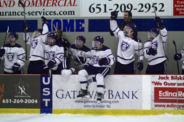 Coach Jeff Boeser is in his seventh year as head men's hockey coach. The team celebrated as Boeser recorded his 100th win last Friday with a victory over Hamline University. (Carolyn Meyer/TommieMedia) 