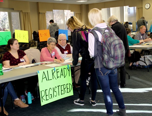 Students stand in line in McNeely Hall to sign in and get their ballot. Election officials said that turnout is comparable, possibly even higher, to the 2012 presidential election during the first several hours. (Mary Brickner/TommieMedia)