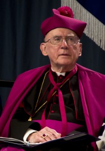 Archbishop emeritus Harry Flynn sits on stage Thursday during the inauguration of President Julie Sullivan. St. Thomas accepted Flynn's retirement as board chair Thursday. (Morgan Neu/TommieMedia)