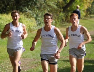 Senior Jake Gerhartz, center, competes at the St Kate's invite on Oct. 10 in St. Paul. Gerhartz won the 2.49-mile race with a time of 12:20. (Photo courtesy of TommieSports) 