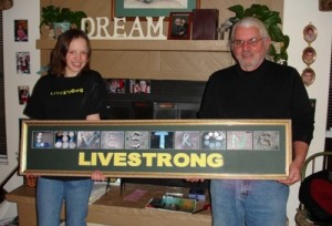 Livestrong1-1 Freshman Alexis Rodarmel presents the gift she made for Richard Gabe in remembrance of his wife, Lindsay Gabe. (Photo courtesy of Alexis Rodarmel)