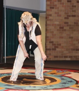 Actress George Keller wheres authentic Native clothes to represent coyotes. Her performance was one of many St. Thomas events during Native American Heritage Month. (Theresa Bourke/TommieMeida)