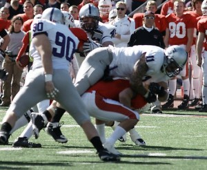 <p>Tommy Becker sacks St. John's quarterback Joe Boyle. The Tommie defense will need to keep pressure on Augsburg quarterback Marcus Brumm, two-time MIAC playter of the week. (John Kruger/TommieMedia)</p>