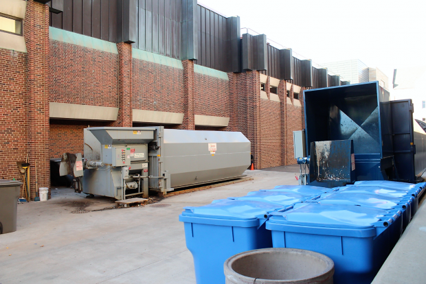 St. Thomas recycling and trash compactors by the Anderson Parking Facility. The new recycling carts and collection program for St. Paul residents will be implemented by Jan. 16. (Danielle Wong/TommieMedia) 