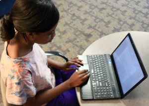 Accounting major Sarah Ubani reviews the constitution for the minorities in business club. The organization is expected to be added to campus in fall 2013. (Eden Checkol/TommieMedia)</p>