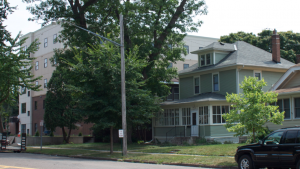 A new apartment complex for students sits next to homes on Grand Avenue. Area Manager for Off-Campus Student Services Josh Hengemuhle said communication is key in maintaining good relations with university neighbors. (Gabrielle Martinson/TommieMedia) 