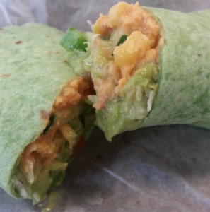 A vegan-friendly wrap; Red Pepper Hummus, Guacamole, corn and lettuce. This is an example of one of my meals from the week. (Caroline Rode/TommieMedia) 
