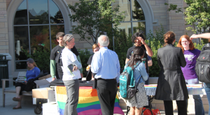 Faculty adviser Cara Anthony and other members of the St. Thomas Allies club handed out T-shirts to celebrate National Coming Out Day. NCOD takes place October 11. (Grace Pastoor/TommieMedia)