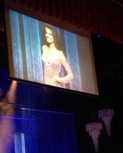 Senior Jessica Scheu appears on the large screen during the Miss Minnesota USA pageant on Sunday. Scheu was named first runner-up out of 39 competitors in the contest. (Photo courtesy of Jessica Scheu)