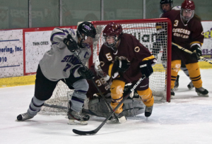 Forward Kelsey Barnier attempts to overcome the Cobber defense at the goal earlier in the season. St. Thomas will face Gustavus in the MIAC championship Saturday (Morgan Neu/TommieMedia). 